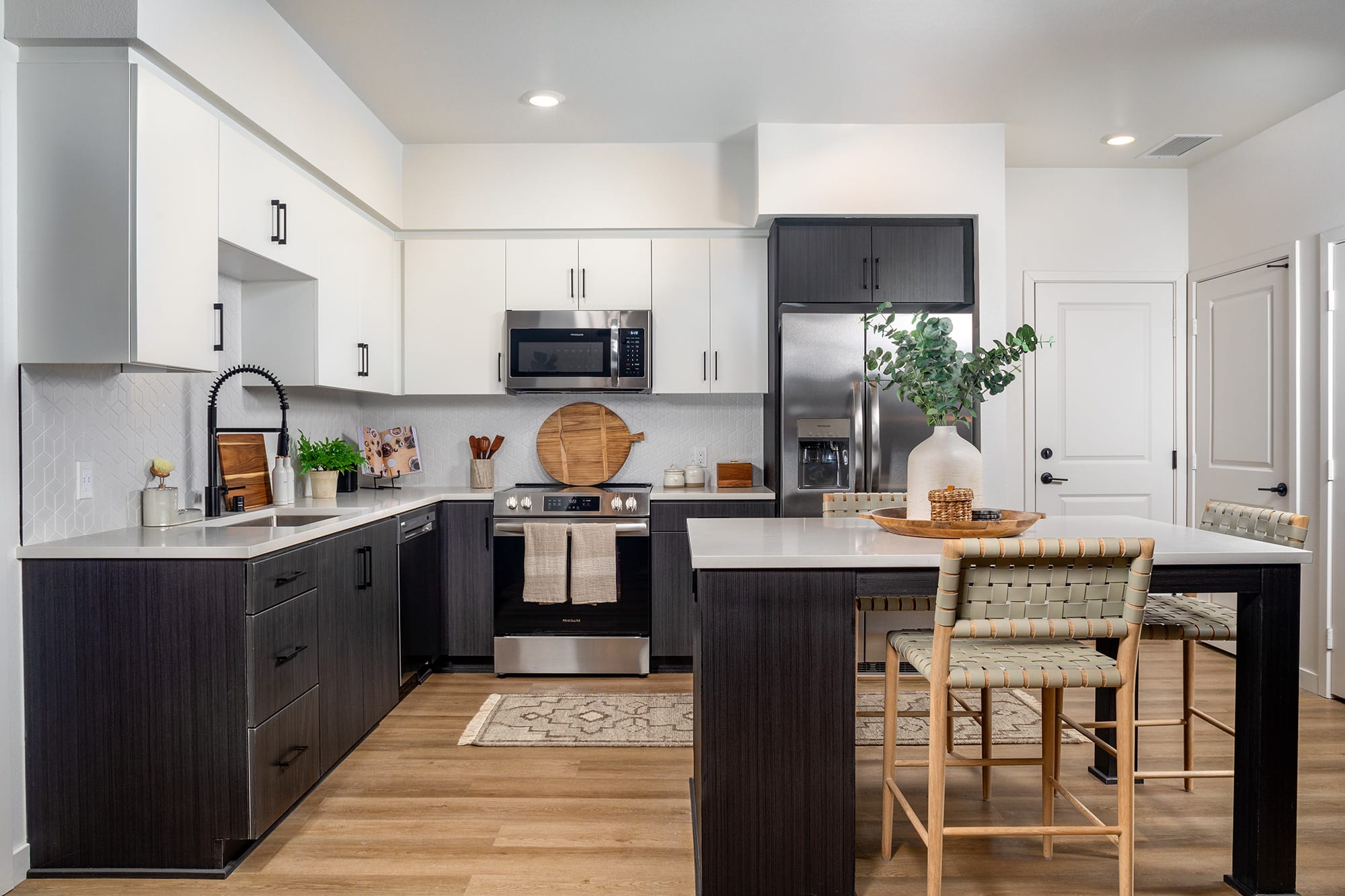 Modern kitchen with quartz countertops at Ironwood dog-friendly apartments in San Diego